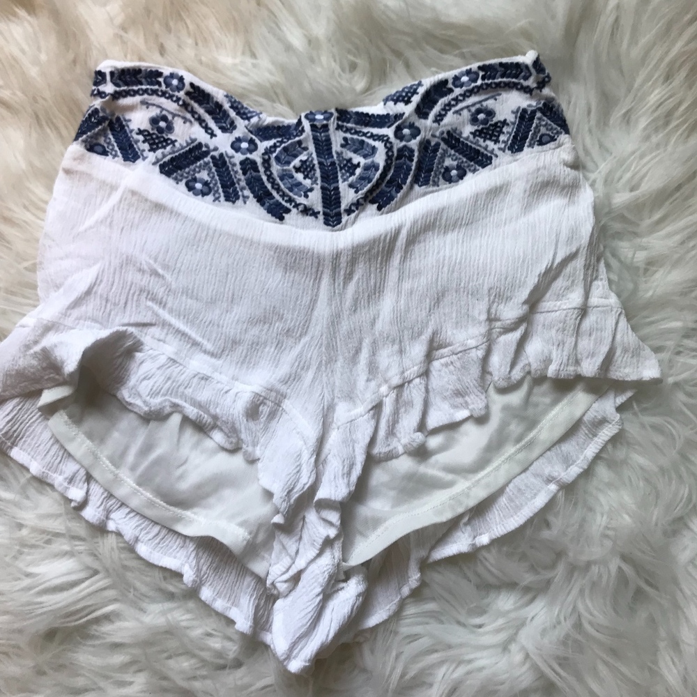 White Shorts With Blue Embroidery Detail